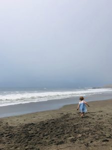 Child playing at the beach