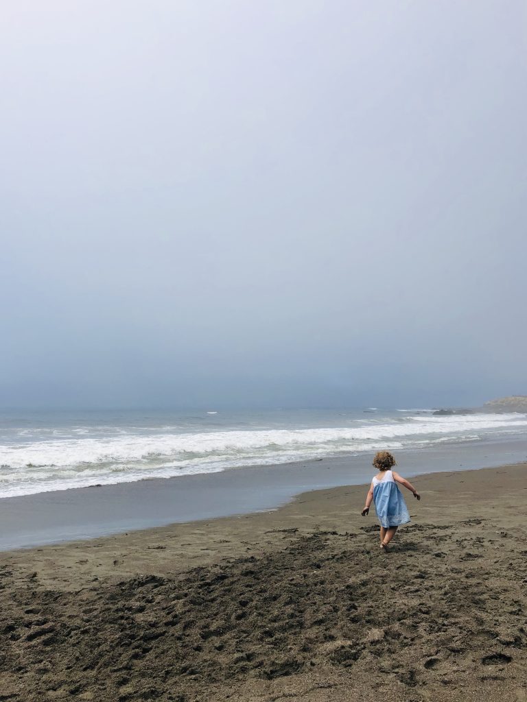 Child playing at the beach