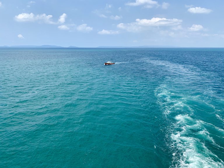 Ocean water with a boat