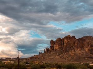 Mountainside with a cloudy sky