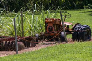 Old tractor in a grass field