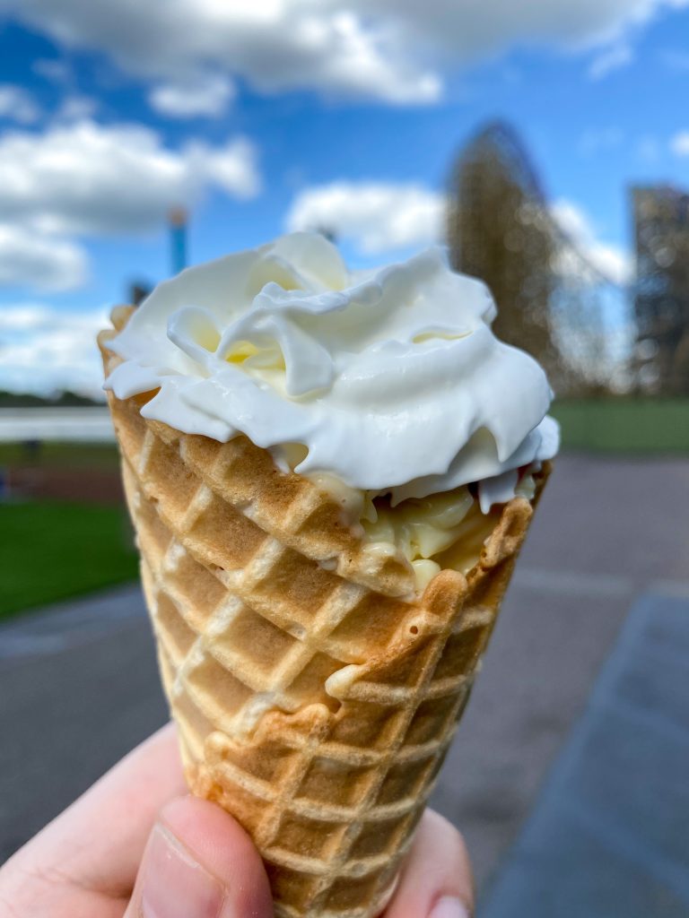 Dessert inside of a waffle cone at a theme park