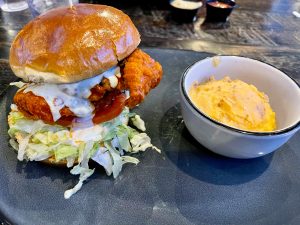 Hot chicken sandwich with cheddar mashed potatoes