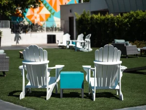 White Lawn chairs with a blue side table