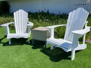 A set of white Adirondack chairs