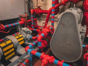 Mechanical pipes inside the USS Midway engine room