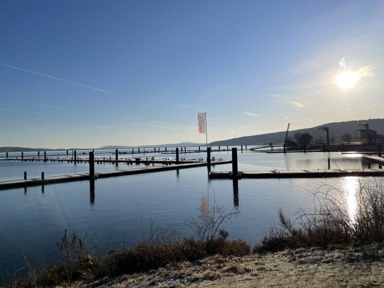 Empty boat pier in winter at Brombachsee, Bavaria, Germany