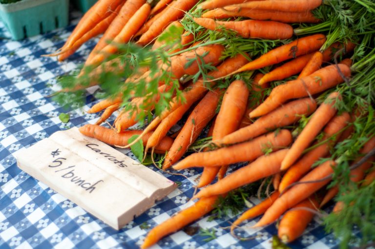 Bunch of carrots on sale for $5 at the Parkdale Farmers Market