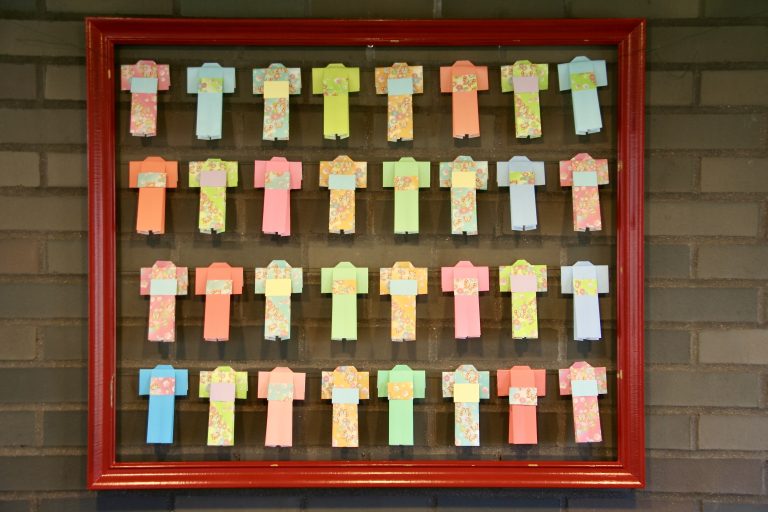 32 Origami Kimonos in a red frame from the 2015 Japanese Festival at the Missouri Botanical Garden