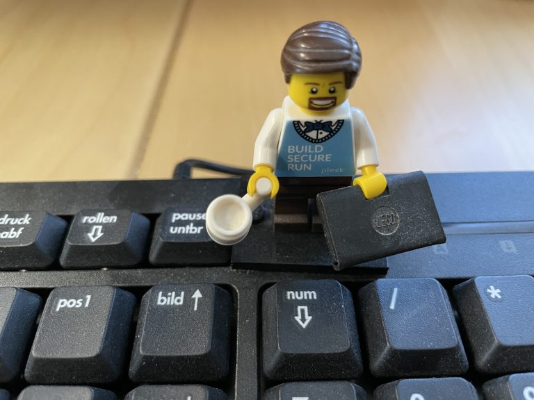 LEGO figure on keyboard.