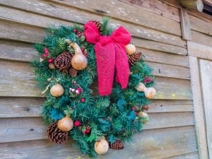 Holiday wreath on an old wooden house.