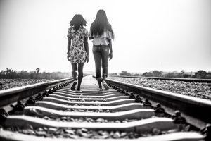 Young ladies on a railway track in Abuja, Nigeria