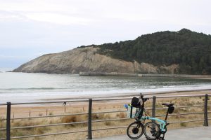 Foldable bike by the seaside.