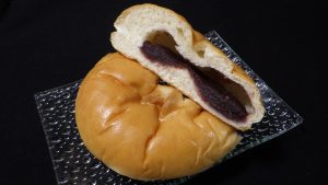 Anpan / Anpan is a Japanese bun filled with sweet red bean paste.
