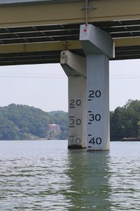 Bridge clearance markers on a concrete highway support, Little Tennessee River, Tennessee