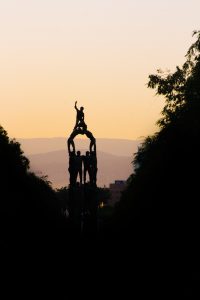 Backlit photograph, during sunset, of the Monument to the Castellers located in the city of Tarragona (Catalonia, Spain).
