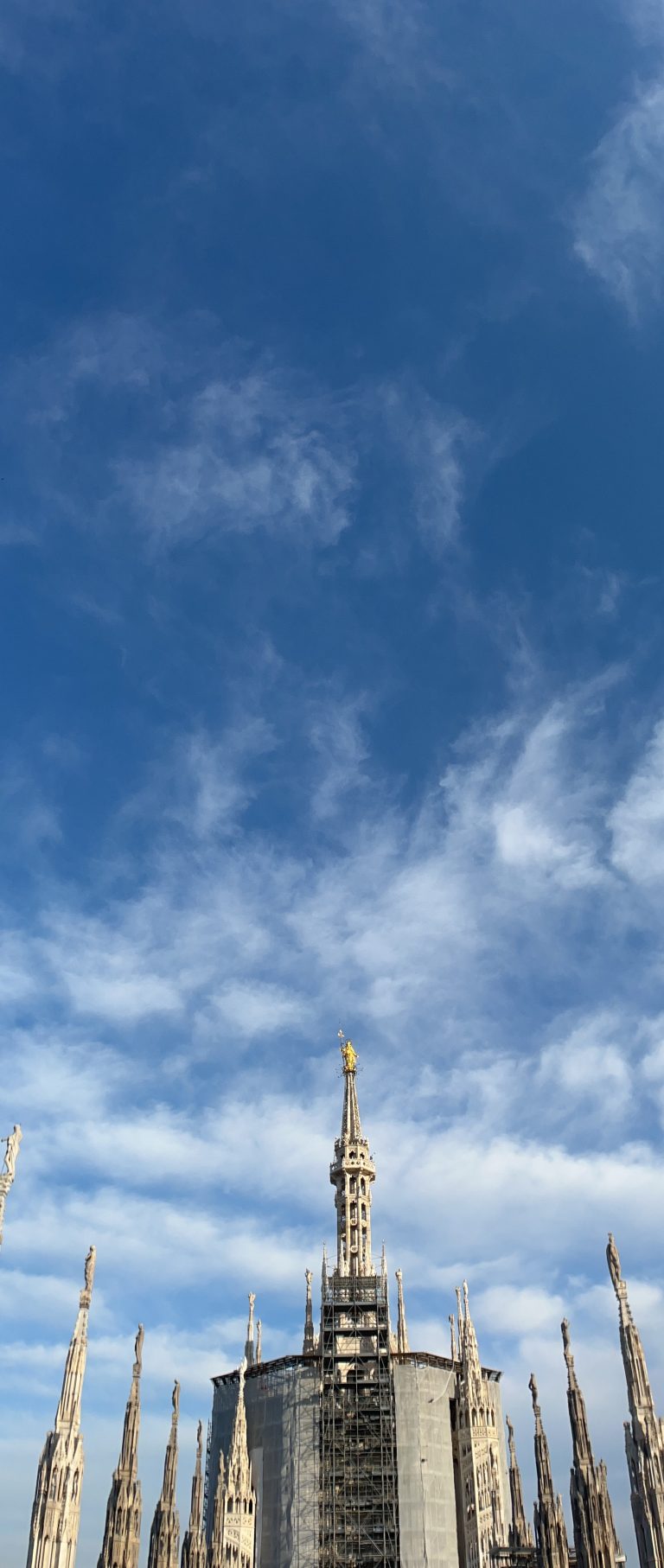 Golden spire, cathedral, Duomo de Milano, Milan, italy