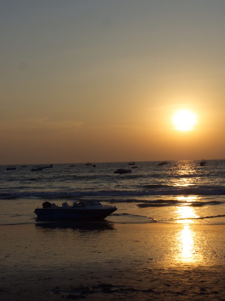 A sunset over the beach of Goa, India