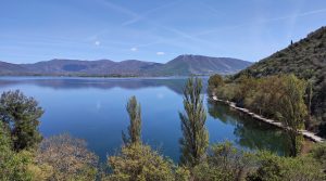 View of Lake Orestiada, Kastoria, on a shiny spring afternoon.
