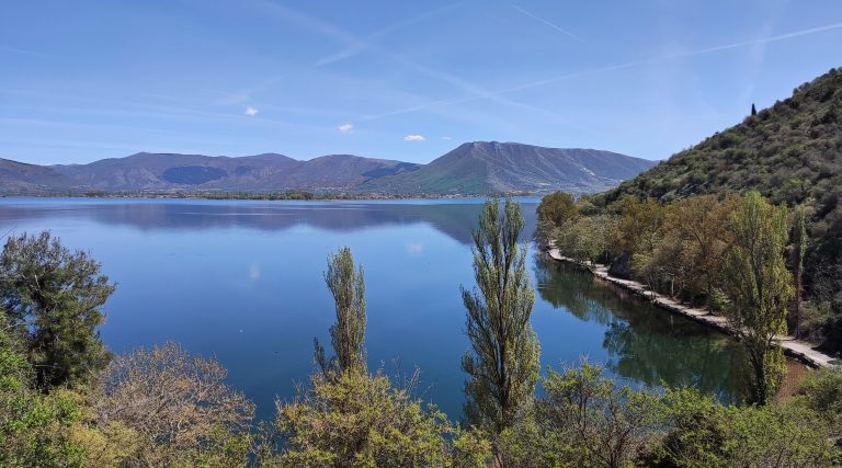 View of Lake Orestiada, Kastoria, on a shiny spring afternoon.