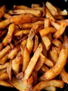 A tangled mess of greasy spoon fries.
