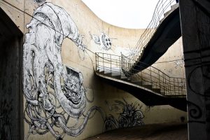 Urban work or graffiti wall representing the interior of the ocean. Work done in 2009 by the artists San, Seal and Kraser, located in the Lantern of the Carlos III Wall in Cartagena, Murcia.