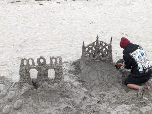 Sand art. Mom. Sand Castle. Sand artist. Ocean Beach. California.
