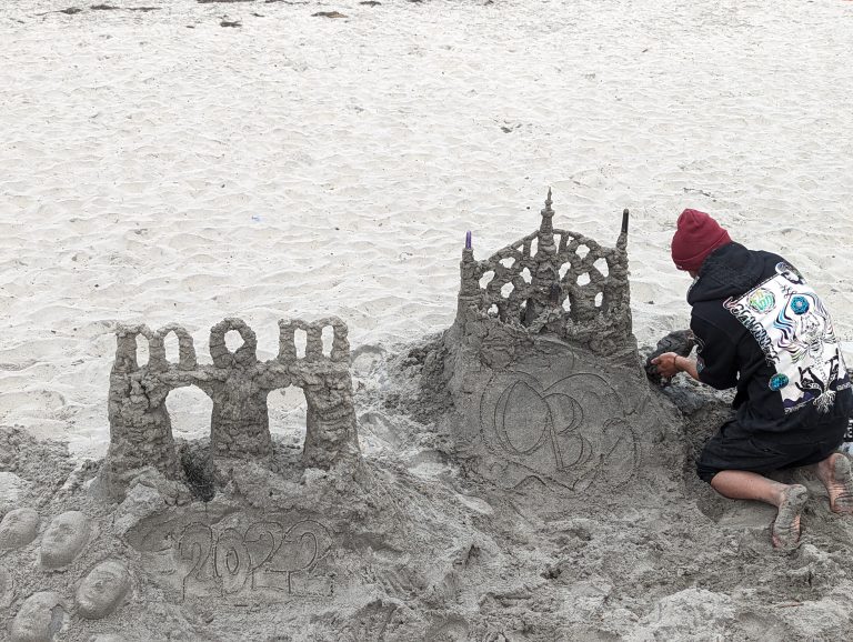 Sand art. Mom. Sand Castle. Sand artist. Ocean Beach. California.