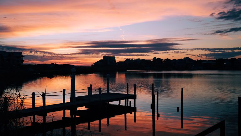 A colorful sunset over the docks in Destin, Florida