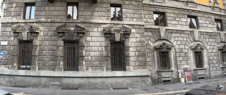 Stone walled apartment building, Milan, Italy