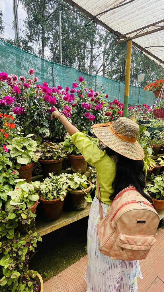 A girl showing beautiful flowers