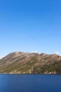 Clear sky photo of a Norwegian fjord