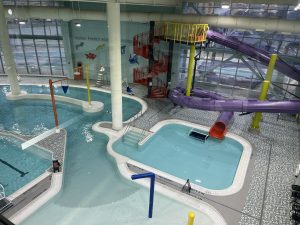 Elaborate swimming pools with slides
