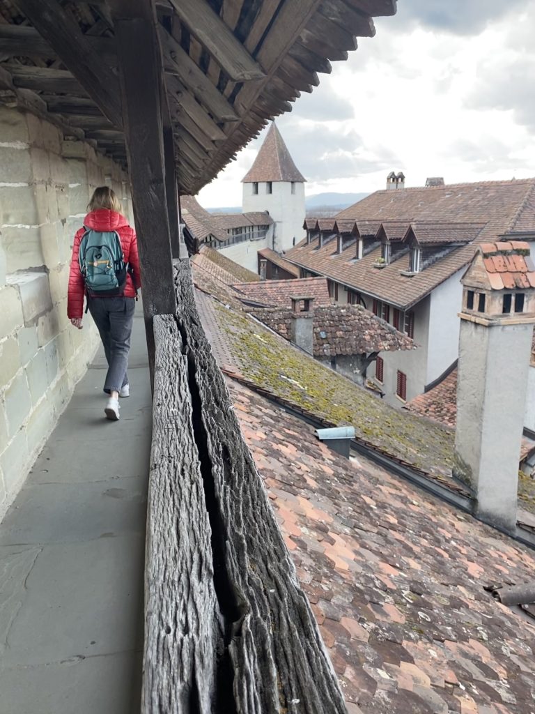 A person walks on the battlements at Murten/Morat