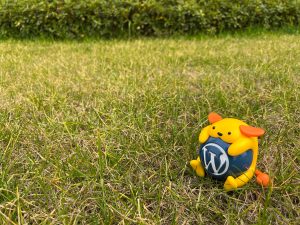 Nature Wapuu Wallpaper Collection: Wapuu on newly sprouted grass