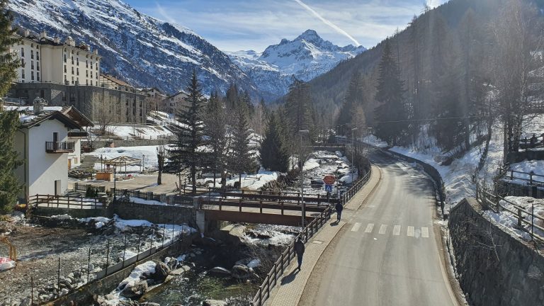 Mountain road with torrent, La Thuile, Valle d’Aosta, Italia