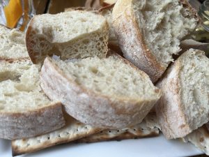 View larger photo: A plate covered in chunks of heavy bread.