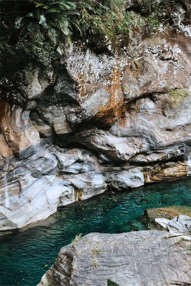 Textured rocks along the river in Taroko Gorge, passing by the Shakadang Trail