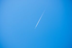 vapor trail, airplane, low angle view, flying