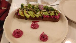 Avocado open-sandwich with beetroot sauce
