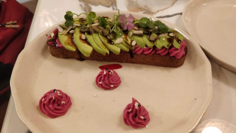 Avocado open-sandwich with beetroot sauce