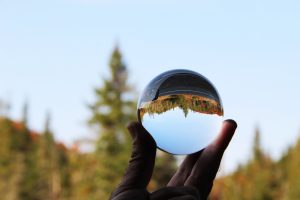 View larger photo: The Adirondack Mountains reflected through a lens ball.