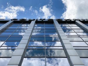 symmetrical minimalistic photo of a glazed building