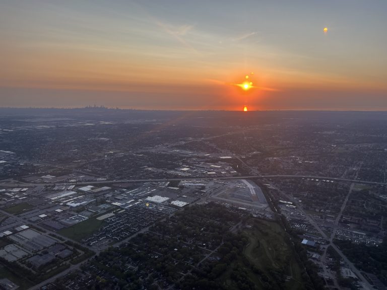 Sunrise over Lake Michigan near Chicago, Illinois, as seen from an airplane.