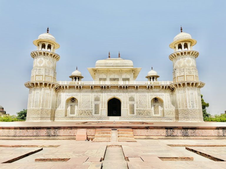 Tomb of I’timād-ud-Daulah aka Baby Taj. Agra, India. A beautiful white building that looks like a temple, in Indian style.