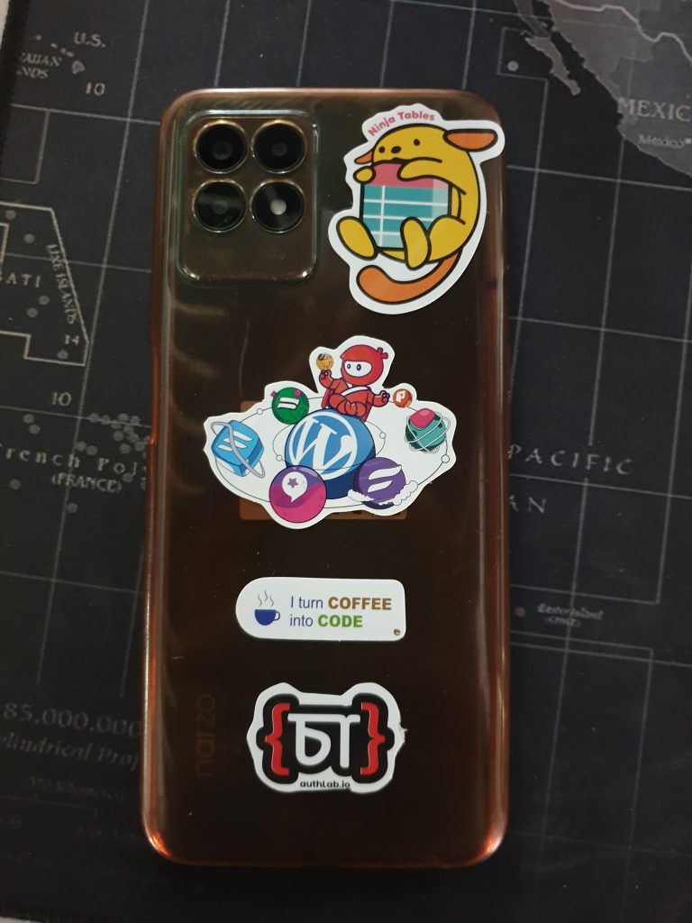 Wappu stickers on the back of a phone.