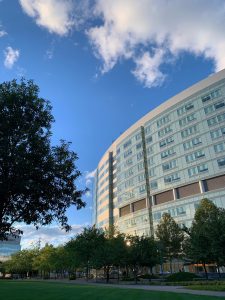 A tall, shiny building with a neatly manicured park with trees in the foreground. Nationwide Children’s Hospital, Columbus, Ohio
