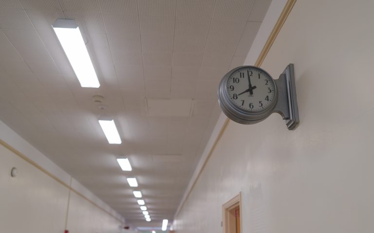 Art deco wall clock in a hallway