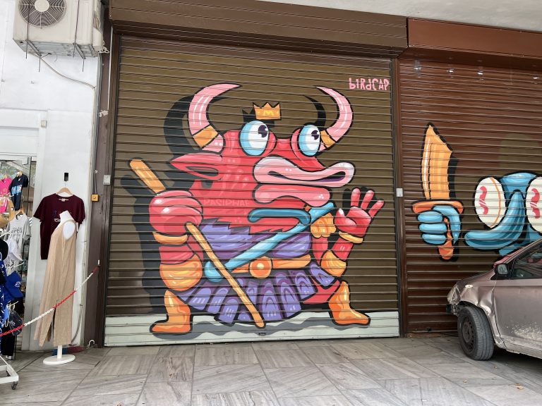 Graffiti on a vendor’s stall door in Athens, Greece. WCEU