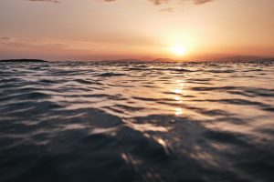 Greek ocean at sunset, calm waters

